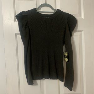 Dark green long sleeve top.
